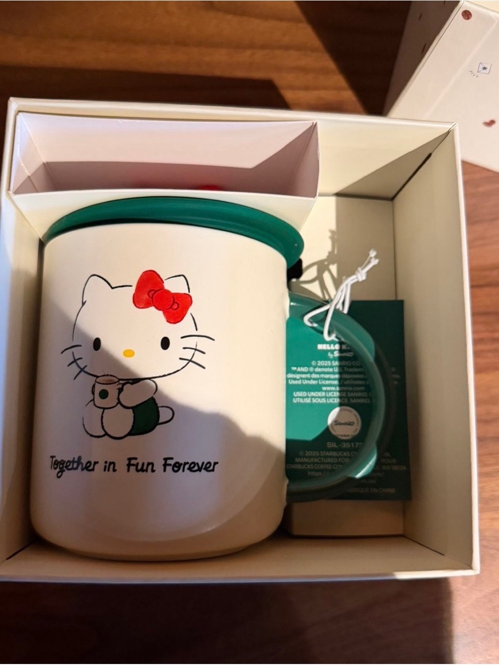 Sanrio Hello Kitty White Mug with Green Rim and Red Bow